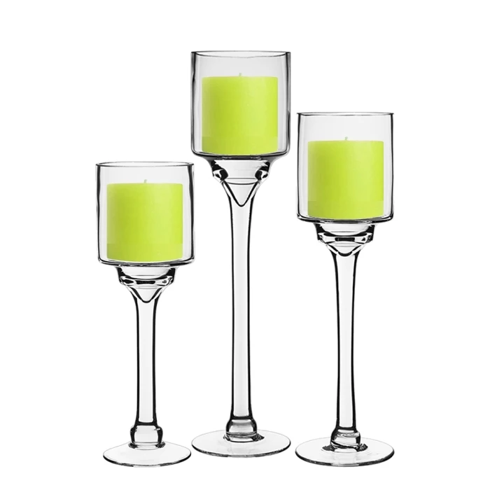 Long Stem Glass Candle Holder Set Of 3. H-12"/14"/16" X D-4" (Pack Of 6 Sets - 18 Pcs) 1 Long Stem Glass Candle Holder Set Of 3. H-12"/14"/16" X D-4" (Pack Of 6 Sets - 18 Pcs)